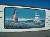 A beautiful mural of a maiden waiting for a ship to return