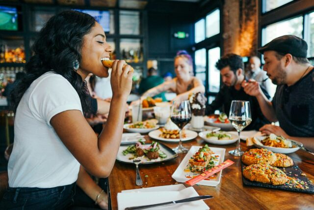people eating food at a restaurant