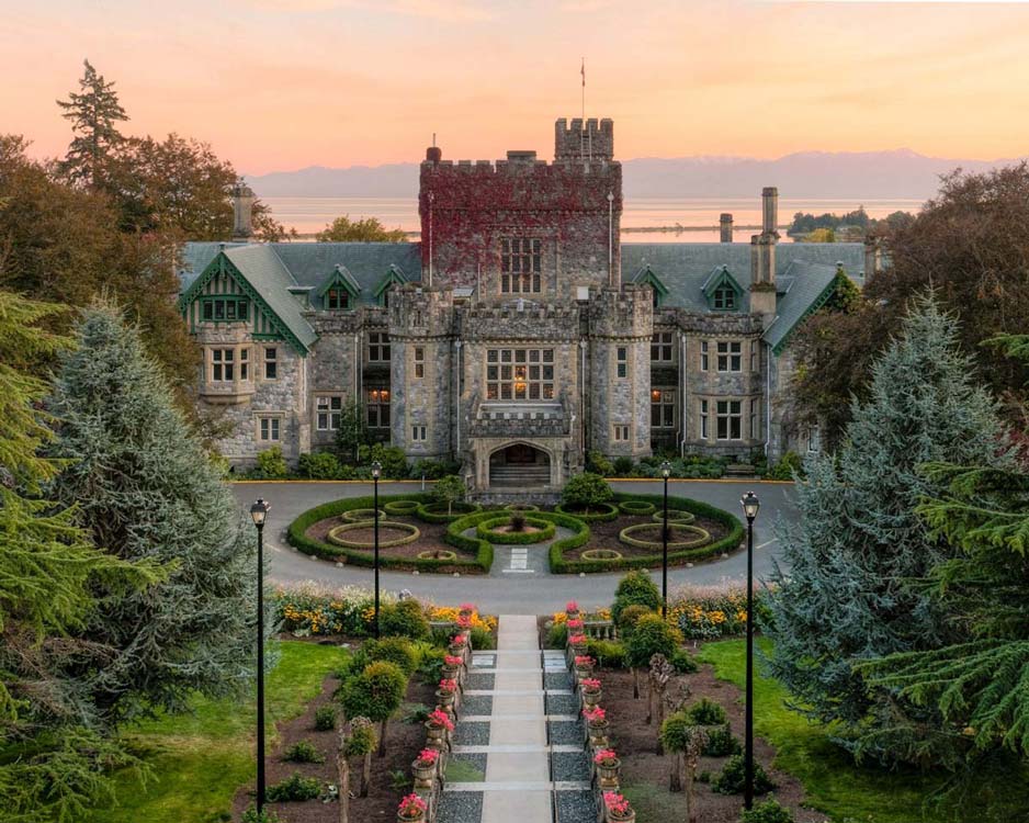 Exterior, high angle shot of Hatley Castle entrance at sunset in the fall