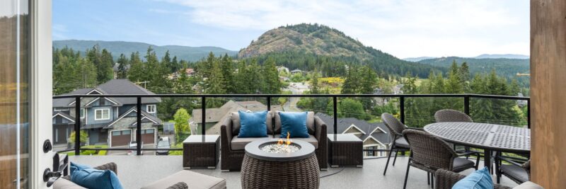 panoramic image of a luxury deck in Westshore & Bear Mountain - fire pit, outdoor furniture stunning views