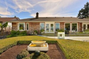 Beautiful backyard living and garden spaces.