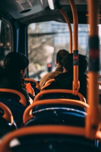 inside of a bus - over a line of seats looking to the front