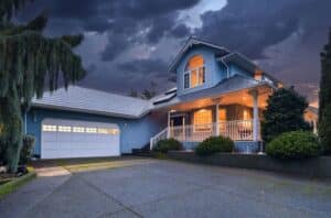 exterior shot of Mill Bay Manor vacation rental on a stormy day
