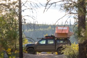 Camping car in recreation site at sunrise