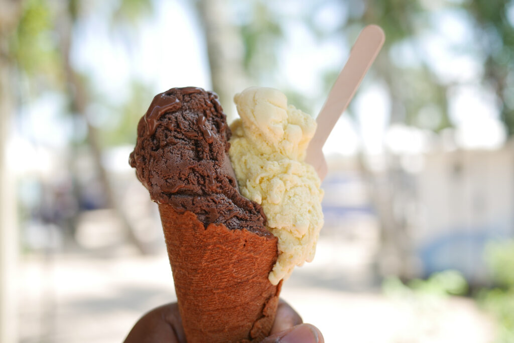 waffle cone with scoops of chocolate and vanilla gelato